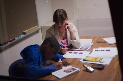 Speech-Language Pathology M.A. student with client